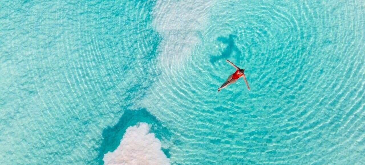 Floating in Siwa salt lakes during Siwa Oasis tour