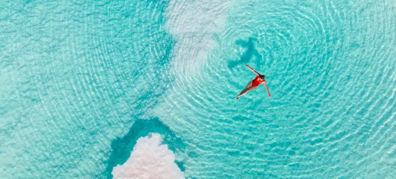 Floating in Siwa salt lakes during Siwa Oasis tour