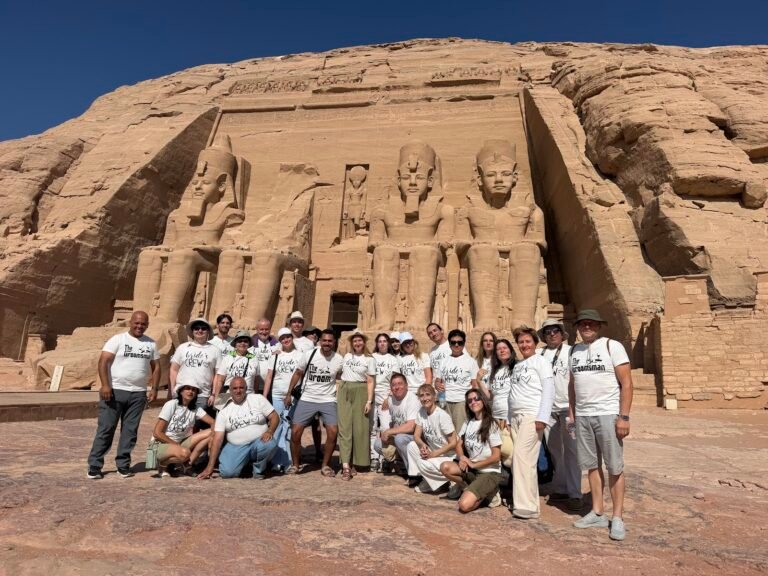 Crossroads Travel group in front of the Great Temple of Ramses II on an Abu Simbel day trip from Aswan