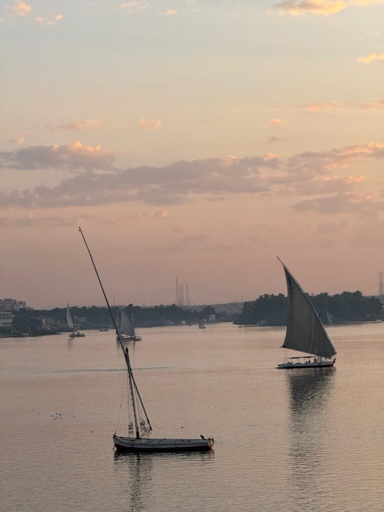 Felucca sailing on the Nile in Aswan at sunset